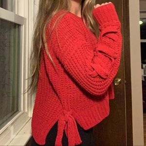 red tie sweater